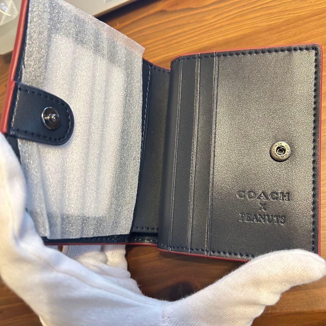 超大人気❤️COACH × PEANUTS スヌーピー コラボ 二つ折り財布
